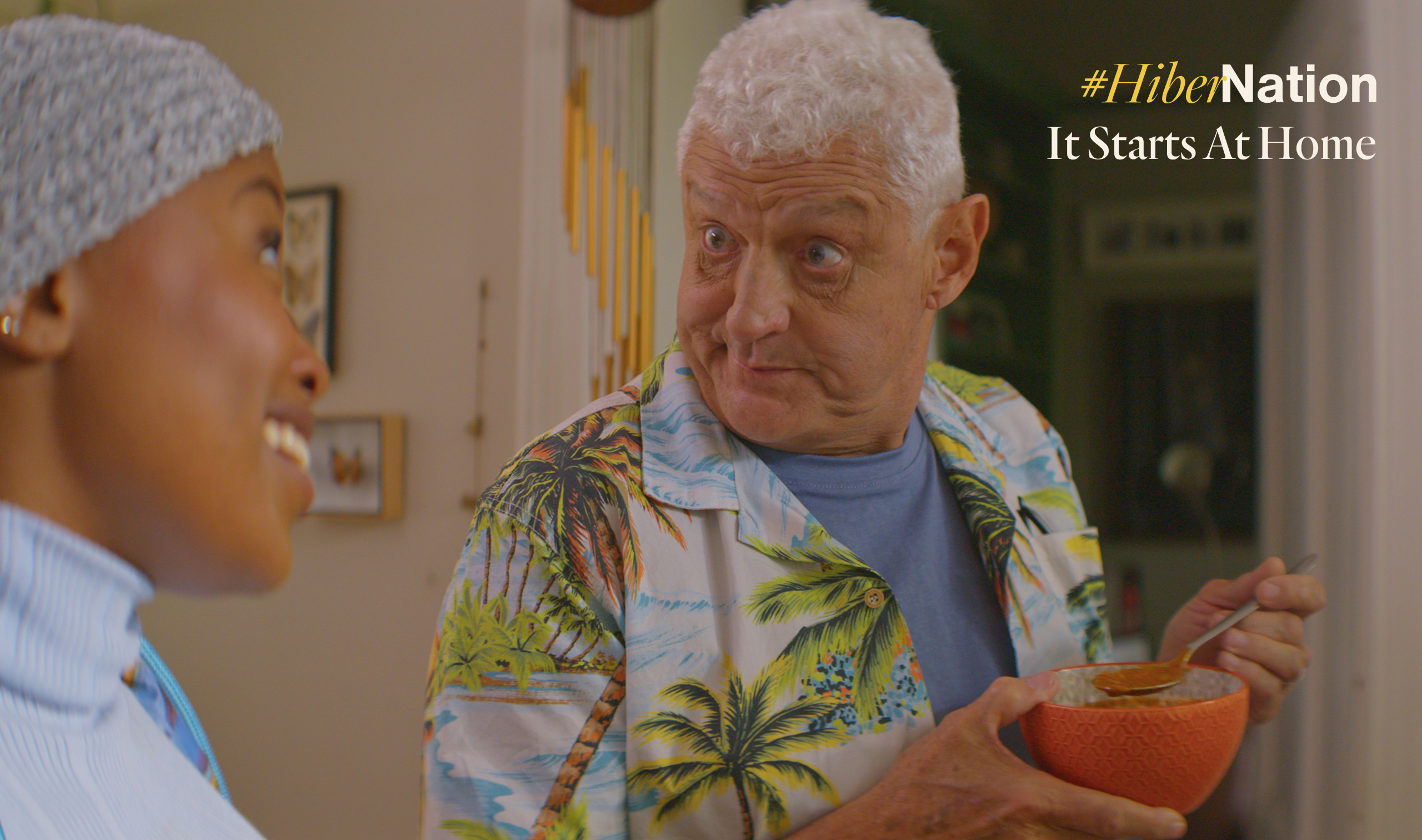 Barry Hilton looking surprised eating a bowl of soup
